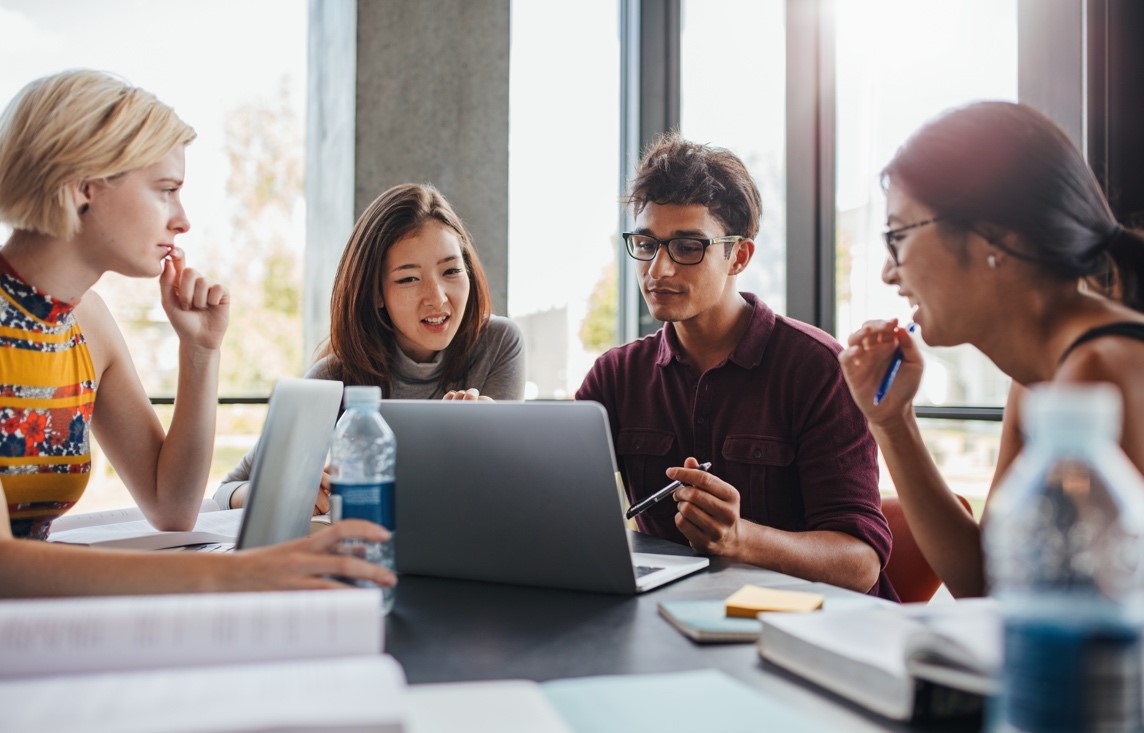 students in front of computer